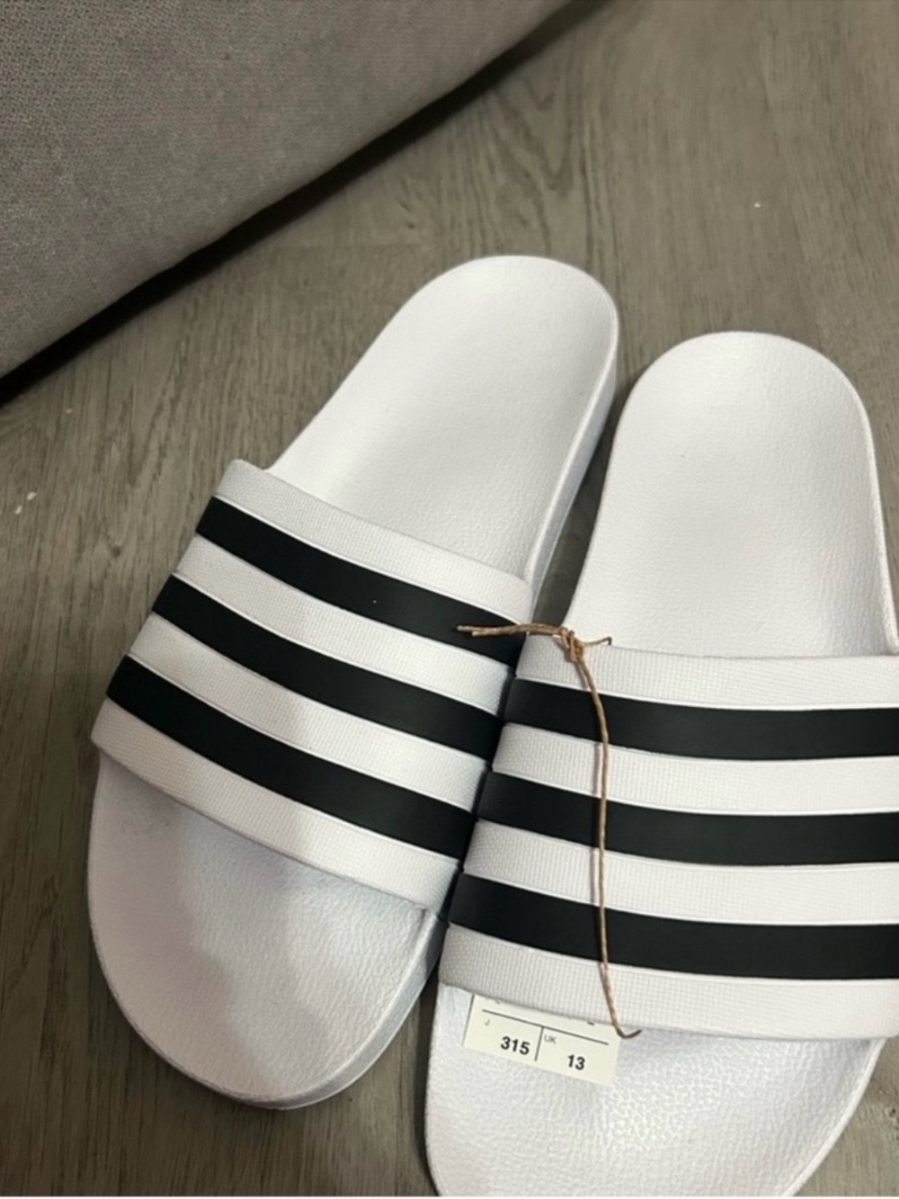 NWT adidas Men’s Size 13 Adilette White and Black Three-Stripe Slide Sandals